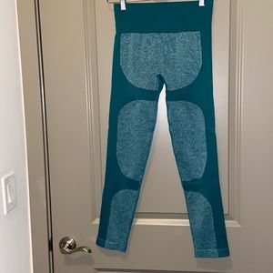 Large body contouring green workout leggings. Great compression band.